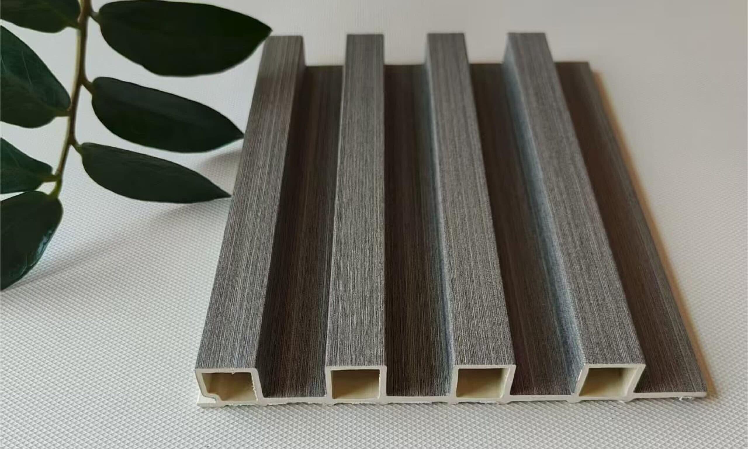Close-up of a fluted WPC wall panel profile
